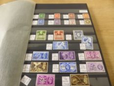 COMMONWEALTH, BRITISH ARABIA, AND AFRICAS GVI-EARLY QEII LARGELY MINT 32 page stockbook with fine