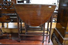 An early 20th Century mahogany gateleg occasional table