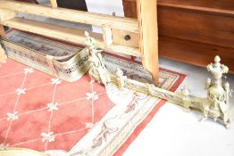 A selection of antique brass fire fenders