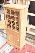 A modern pine 12 bottle wine rack