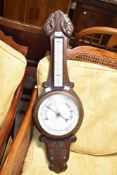An early 20th Century oak cased barometer