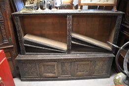 A carved period oak bookshelf, width approx. 185cm