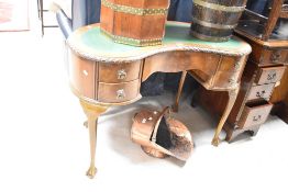 An early 20th Century kidney shaped desk or dressing table, width approx. 108cm
