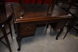 An oak desk or dressing table in the Queen Anne style , width approx. 106cm