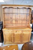 A modern pine kitchen dresser, width approx. 142cm
