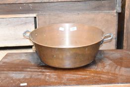 A two handled copper jam pan