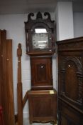 A Victorian long case clock having 30hr movement and painted dial, face worn
