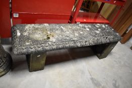 A cast composite stone garden seat , width approx. 135cm