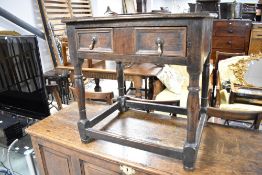 A period oak side table having frieze drawer and turned frame, width approx. 63cm