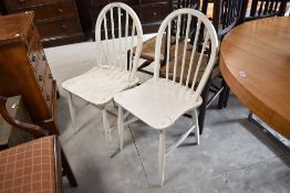 Two painted Ercol style hoop and stick back kitchen chairs