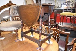 An early to mid 20th Century oak gateleg occasional table