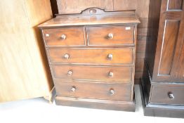 A modern dark stain chest of drawers in the Victorian style, width approx. 92cm