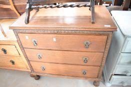 An early 20th Century oak three drawer bedroom chest