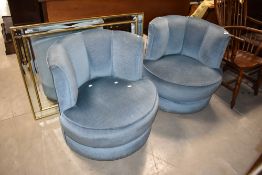 A pair of vintage shell designer style easy chairs , in blue dralon, sold as upholstery project