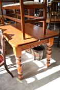 A traditional pine kitchen table, approx. 136 x 80cm