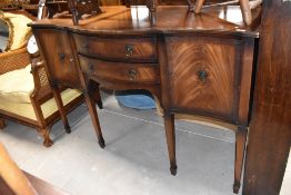 A reproduction Regency sideboard