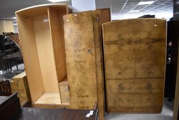 A mid 20th Century walnut four piece bedroom suite