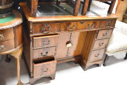 A reproduction Regency style pedestal desk, width approx. 107cm
