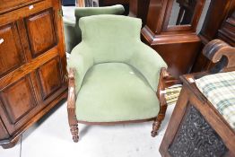 A Victorian mahogany frame tub chair having green dralon upholstery