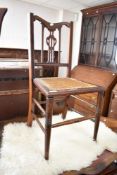 A Victorian cane seated bedroom chair
