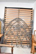 A pair of modern cast iron Gothic style bed frames