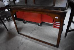 A reproduction oak over mantel mirror in the Titchmarsh and Goodwin style, width approx. 96cm