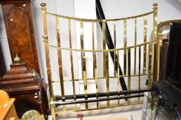 A brass double bed frame