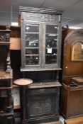 A period oak carved display cabinet , of Dutch design, height approx. 214cm