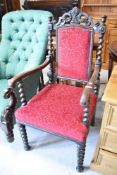 A 19th Century twist frame carver chair having later burgundy upholstery