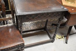 A 19th Century oak side table, having carved frieze, width approx. 71cm