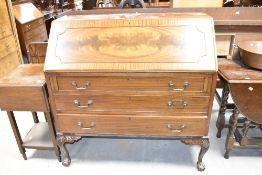 An early 20th Century bureau, on ball and claw feet, width approx. 107cm