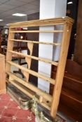 A stripped pine open delft rack, width approx. 165cm