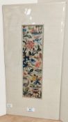 A Chinese polychrome embroidered silk panel, of oblong form and decorated with blossoms, vessels and
