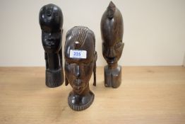 Three vintage ebony carved wood Africa sculptural figures, largest H25cm