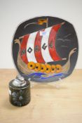 An attractive mid-century wall plate depicting a Norwegian Viking ship decorated in red, blue and