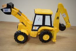 A yellow ceramic JCB tea pot marked to base pattern 754080 H20cm