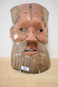 A vintage hand carved pine bust in the style of a Viking warrior, h30cm.