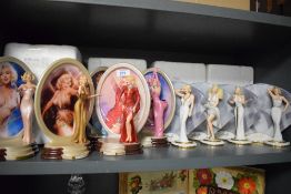 Nine Bradford Exchange figurines five in the series Diamonds and Pearls-Fashions of Marilyn Monroe
