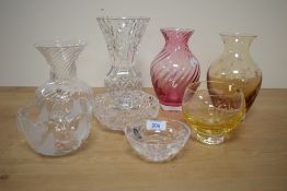 An amber coloured Caithness art glass vase having etched fuchsia design, a Caithness cranberry swirl