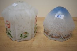 Two vintage glass light shades both in marble glass.