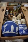 A blue Jasper Ware jardiniere, a Ringtons Tea willow pattern jar, three Hummel figurines, two