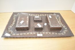 A late 19th / early 20th century brass desk set, beautifully decorated in the Indian biennes