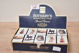 A carton of Sotheby's New Bond Street matchboxes, to include Lady Blunt Stradivarius, Meissen