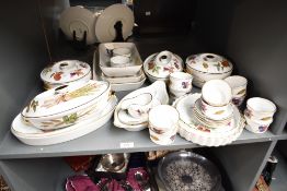 A group of Royal Worcester Evesham pattern dinner wares, decorated with gilt edges, fruit and