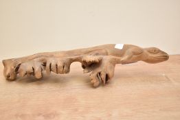 A hand carved wooden Lizard sculpture, L36cm