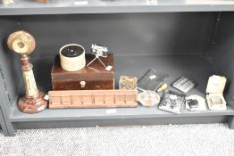 A early 20th century desk barometer having turned serpantine pedestal and temperature gauge,