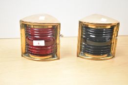 A pair of brass ship lanterns fitted with red and green lenses, h14.5cm