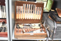 A oak canteen containing various silver plated +s/s bladed cutlery, to include Walton Bros,
