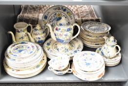 A Mason's Regency pattern ironstone dinner service, decorated with foliage on a cream ground, to
