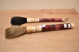 Two large and interesting Chinese bone and polished stained hardstone calligraphy brushes 41cm &
